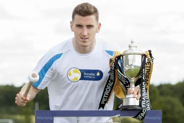 Paul Hanlon signifies the start of the Scottish football season, with Hibs entertaining Rangers at lunchtime today. Picture: SNS
