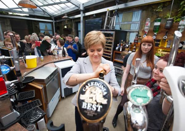 First Minister Nicola Sturgeon attends the re-opening of the Clutha Bar. Picture: John Devlin