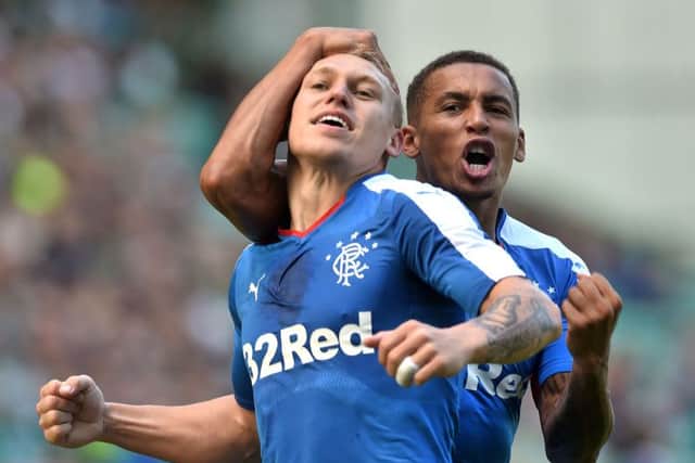 Martyn Waghorn (left) celebrates after scoring his second for Rangers with team-mate and fellow goalscorer James Tavernier. Picture: SNS