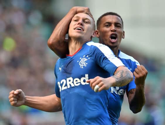 Martyn Waghorn (left) celebrates after scoring his second for Rangers with team-mate and fellow goalscorer James Tavernier. Picture: SNS