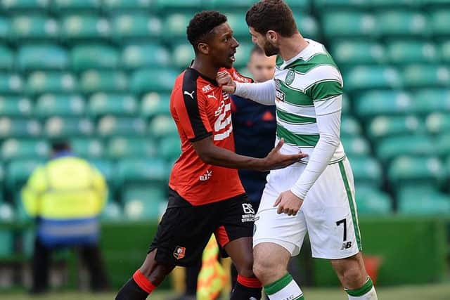 Celtics Nadir Ciftci, right, finds himself the focus of attention once again against French side Rennes. Picture: Rob Casey/SNS Group