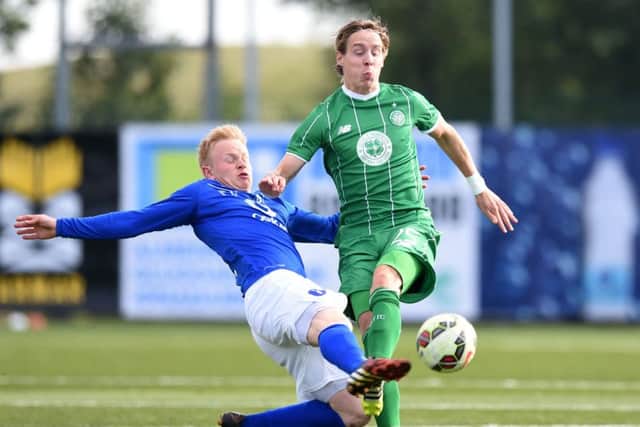 Stefan Johansen is challenged by Stjarnans Thorri Geir Runarsson during Celtics victory in Iceland on Wednesday. Pitcure: SNS Group