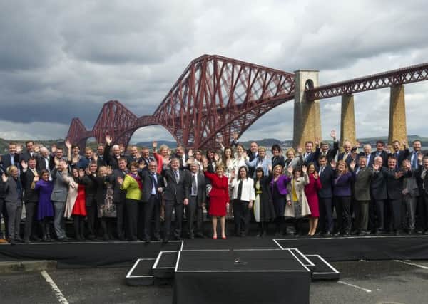 First Minister Nicola Sturgeon with all 56 newly-elected SNP MPs. Picture: Jane Barlow