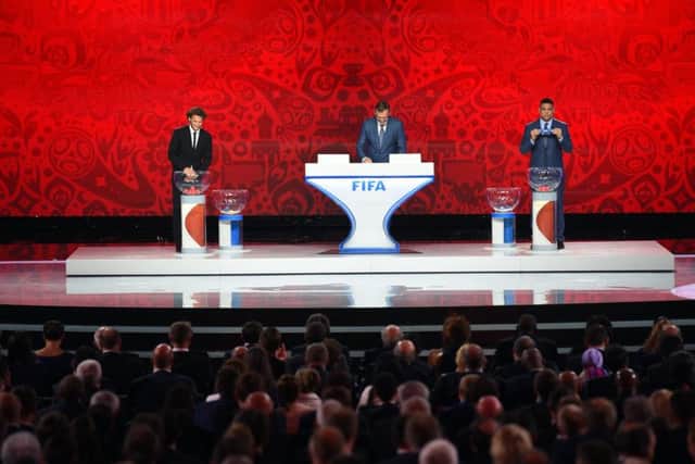 Former German international Oliver Bierhoff draws out Scotlands name in Group F of the World Cup qualifying draw on Saturday. Picture: Getty