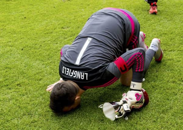Jamie Langfield was emotional at fulltime after an impressive performance in the Pittodrie win over Brighton. Picture: SNS Group