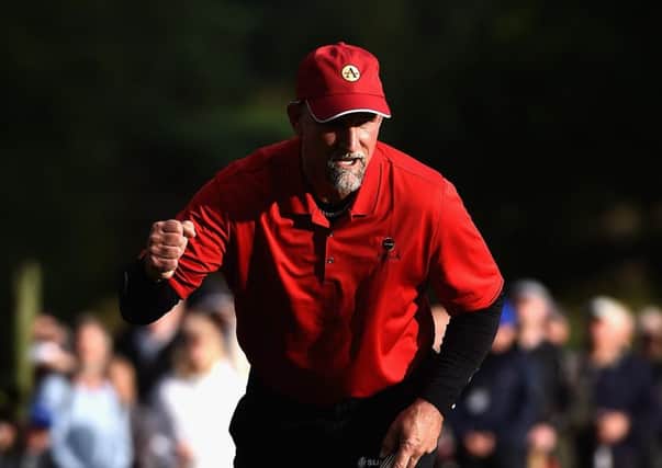 Marco Dawson celebrates after sinking the putt which gave him victory at Sunningdale. Picture: Getty Images