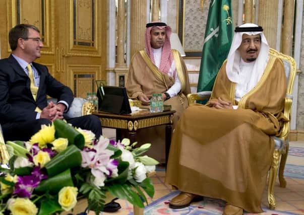 King Salman (right) is embroiled in a row over beach access. Picture: AFP/Getty