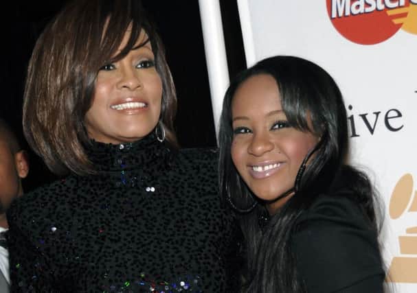 Whitney Houston, left, and daughter Bobbi Kristina Brown. Picture: AP