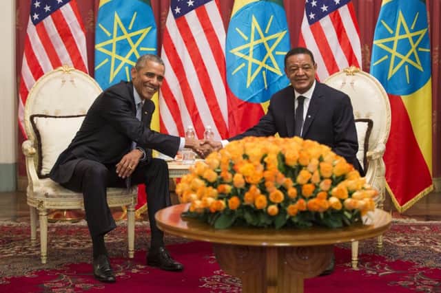 Barack Obama, left, and Ethiopian president Mulatu Teshome shake hands during a meeting yesterday. Picture: AP