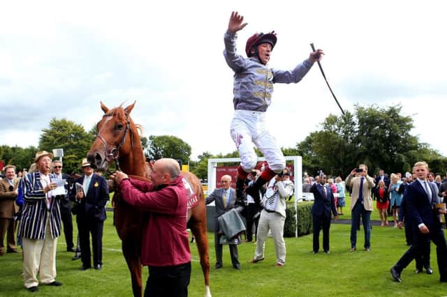 Frankie Dettori produces his traditional dismount after Galileo Gold's victory. Picture: PA