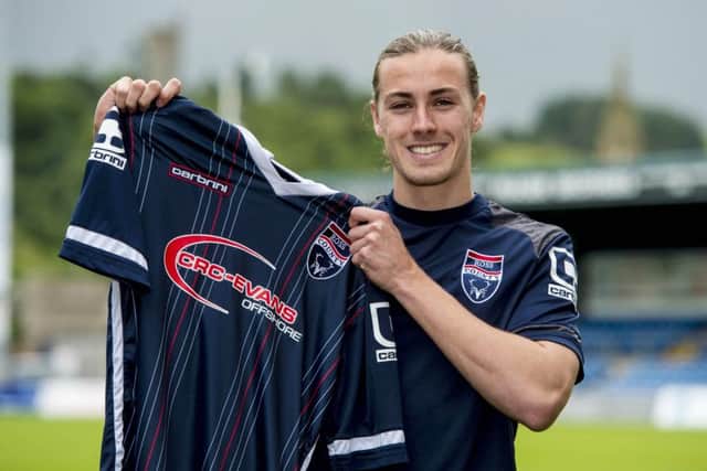 Ross County's Jackson Irvine is all smiles after signing with the Highland club. Picture: SNS