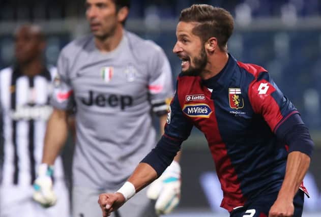Luca Antonini, seen here scoring a goal against Juventus, is a target for Celtic. Picture: AFP