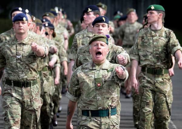 Army reservists take part in a passing out parade at Redford barracks, Edinburgh. Picture: Mark Owens