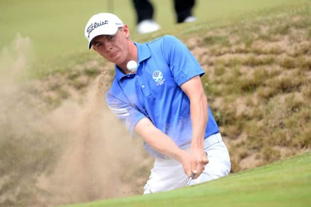 Craigielaw player Grant Forrest plays a bunker shot during the Scottish Amateur Championship at Muirfield yesterday. Picture: SNS