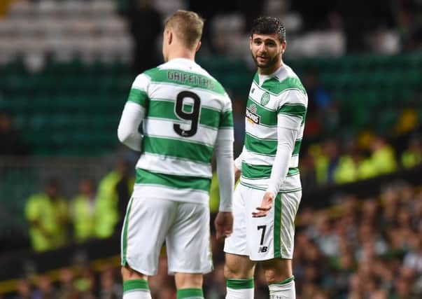 Celtic striker Nadir Ciftci (right) speaks to team-mate Leigh Griffiths during the match against FK Qarabag. Picture: SNS Group