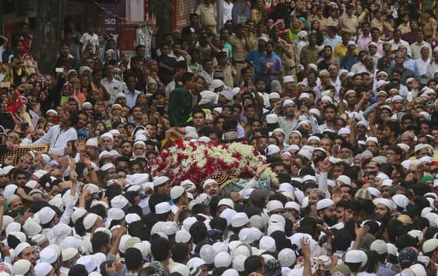 People carry the body of Yakub Memon by his family home at his Mumbai funeral yesterday. Picture: AP