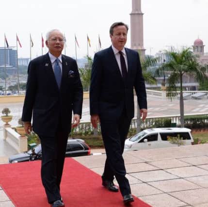 Mr Cameron had one-on-one meeting with PM Najib Razak. Picture: PA