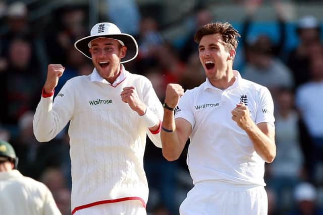 Steven Finn, right, and Stuart Broad jump for joy after Mitchell Johnsons dismissal. Picture: David Davies/PA