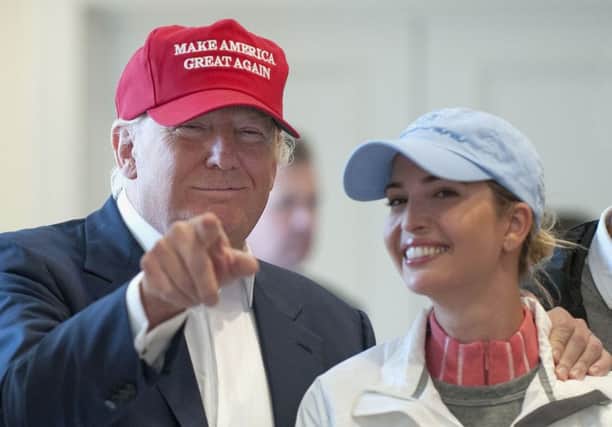 Donald Trump with his daughter Ivanka at Turnberry yesterday. Picture: PA
