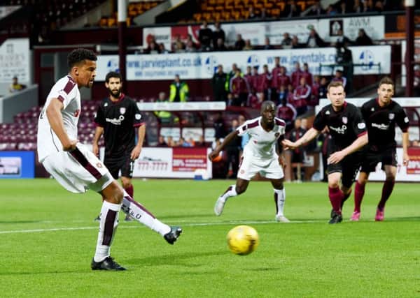 Osman Sow scores from the spot for Hearts. Picture: SNS