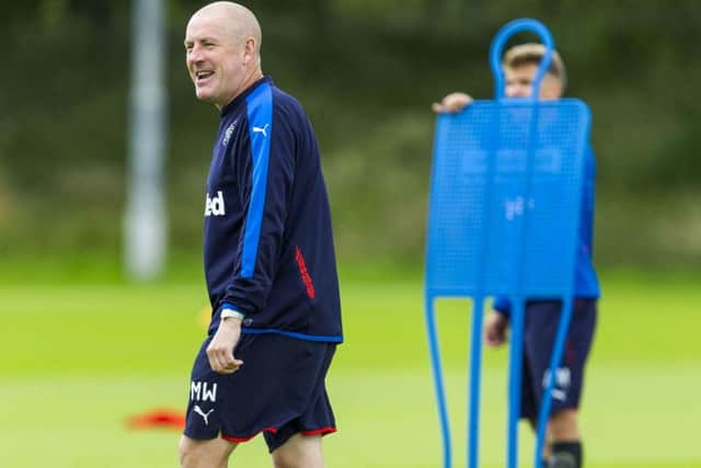 Rangers manager Mark Warburton oversees training ahead of tomorrows League Cup tie with Peterhead. Picture: SNS
