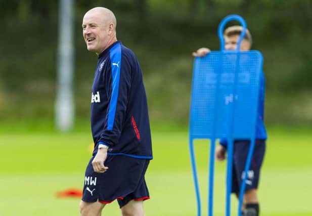 Rangers manager Mark Warburton oversees training ahead of tomorrows League Cup tie with Peterhead. Picture: SNS
