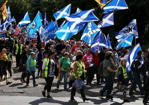 Members of the public take part in a pro-independence march in Glasgow from Kelvingrove Oark to Glasgow Green. Picture: PA
