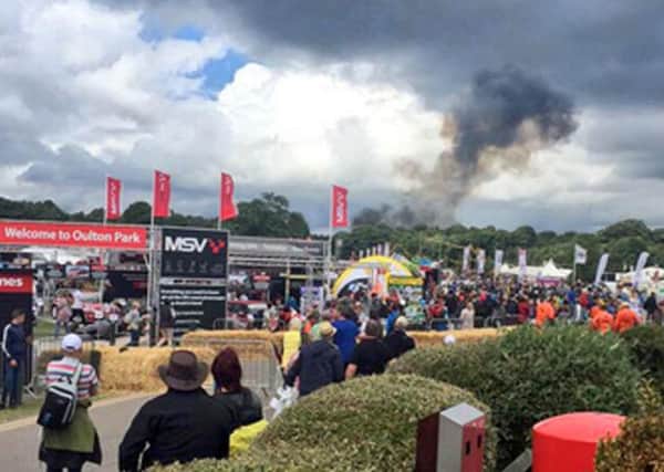 A small aircraft has crashed onto the site of a car festival in Cheshire. Picture: Twitter