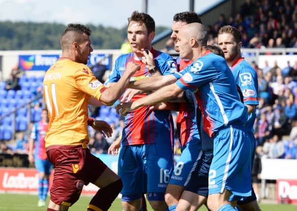 Tempers flare between Inverness players and Motherwell's Marvin Johnson. PIcture: SNS