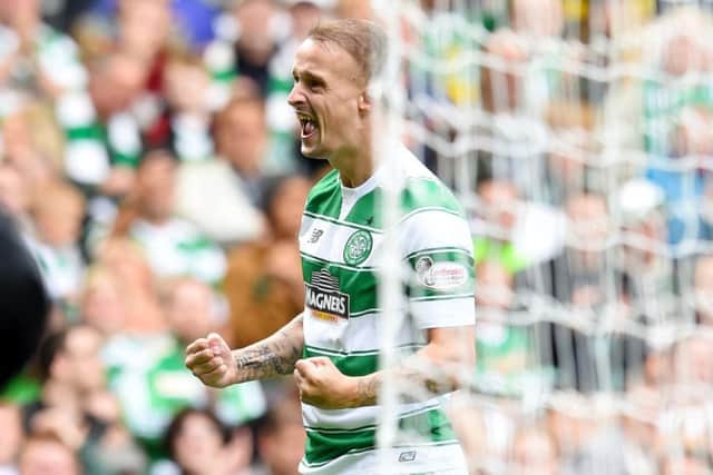 Leigh Griffiths celebrates after scoring his third-minute penalty. Picture: SNS Group