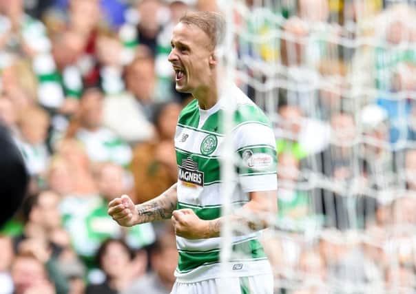 Leigh Griffiths celebrates after scoring his third-minute penalty. Picture: SNS Group