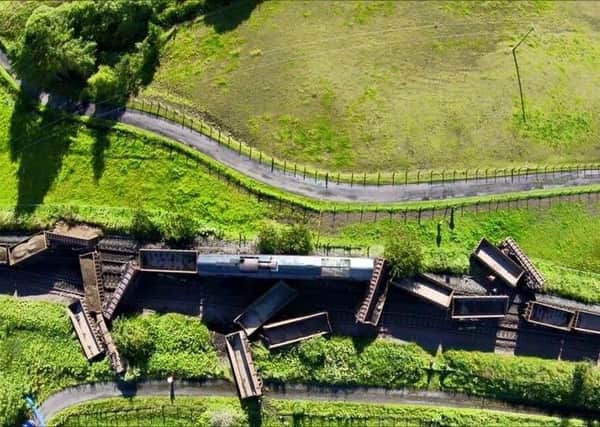 An aerial view of the wagons scattered on the track near Cumnock following the collision between two trains on Saturday. Picture: Contributed