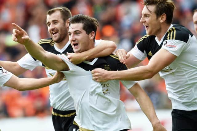 Aberdeen's Kenny Mclean, second from left, celebrates his goal. Picture: SNS