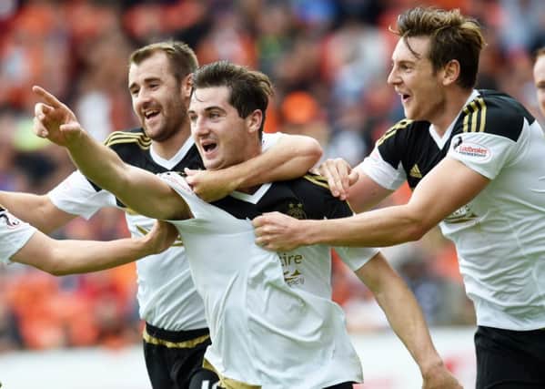 Aberdeen's Kenny Mclean, second from left, celebrates his goal. Picture: SNS