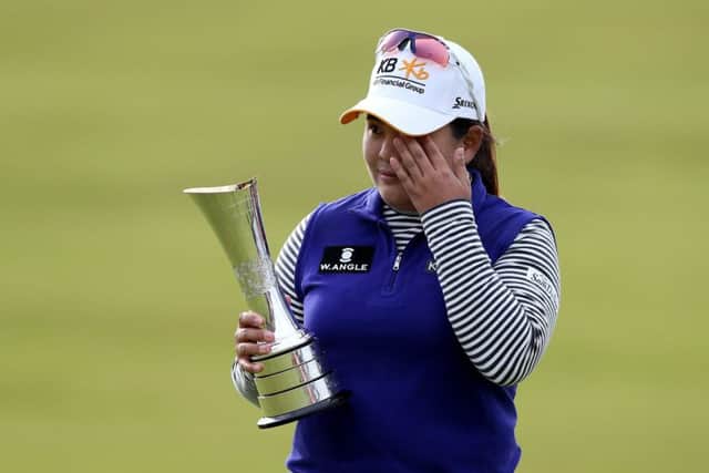 An emotional Inbee Park holds the trophy after winning the Womens British Open at Turnberry yesterday. Picture: AP