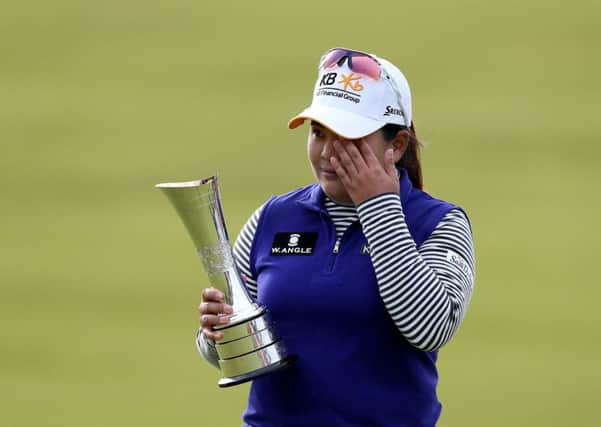 An emotional Inbee Park holds the trophy after winning the Womens British Open at Turnberry yesterday. Picture: AP