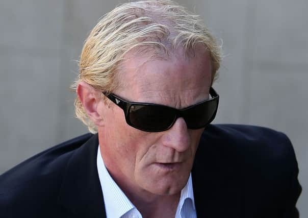 Colin Hendry will go on trial accused of harassing and assaulting his ex-girlfriend. Picture: PA