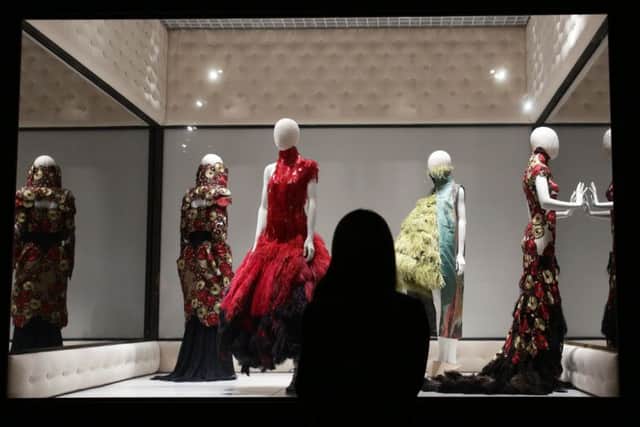 Dresses on display during a press view of the exhibition Alexander McQueen: Savage Beauty. Picture: PA