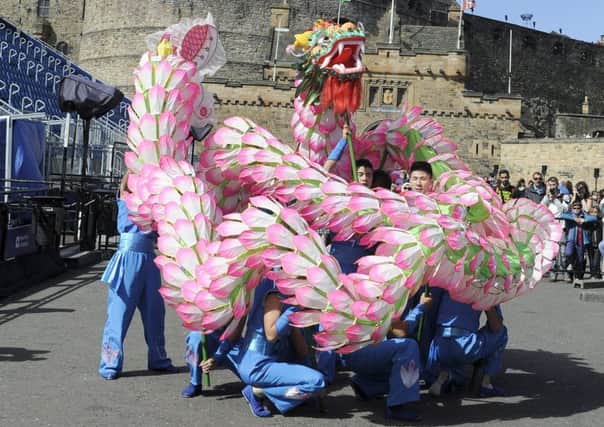 Changxing Lotus Dragon Dance Folklore Group performing at Edinburgh Castle. Picture: Julie Bull