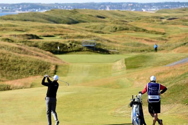 David Howell plays his second shot on the third hole during his semi-final against Robert Karlsson of Sweden at Murcar Links. Picture: Getty Images