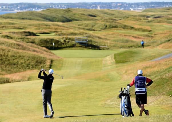 David Howell plays his second shot on the third hole during his semi-final against Robert Karlsson of Sweden at Murcar Links. Picture: Getty Images