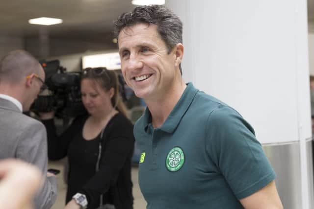 Celtic assistant manager John Collins at Glasgow Airport as his side leave for Azerbaijan. Picture: SNS