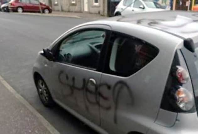 The silver hatchback with the word 'sheep' daubed on the side. Picture: Contributed