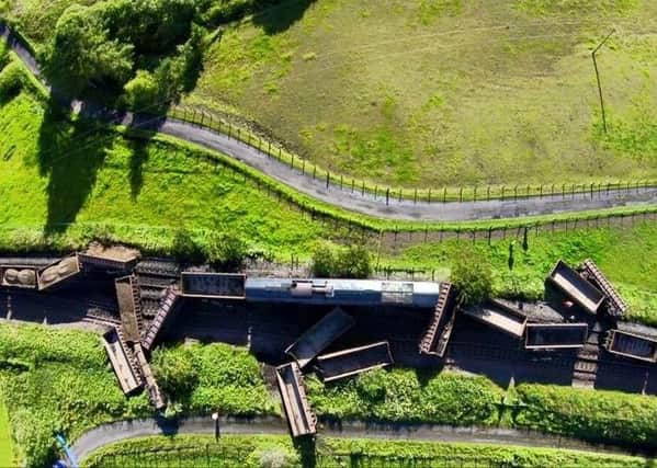 The rail line linking Kilmarnock and Dumfries will be closed for a fortnight following a major crash on Saturday which derailed 18 carriages. Picture: Network Rail