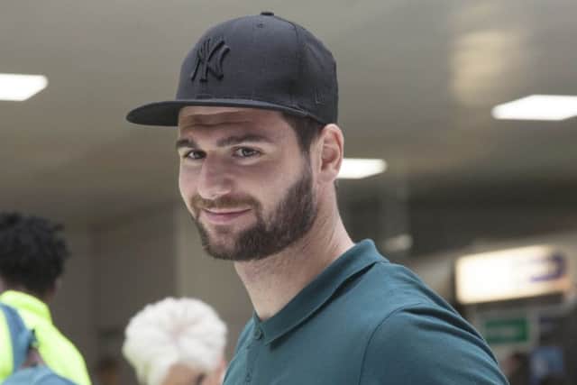 The more physical Nadir Ciftci, leaving from Glasgow Airport yesterday, is likely to be chosen ahead of Leigh Griffiths. Picture: Ross Brownlee/SNS