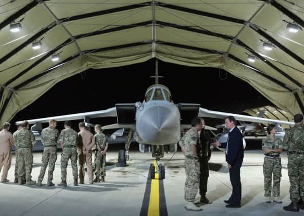 When David Cameron visited RAF Akrotiri in Cyprus last year, he announced the Tornado squadron would carry on operating for a further 12 months  now that has been extended again by a year. Picture: PA