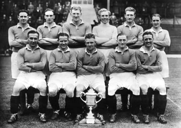 Sammy Cox, back row right, and Bobby Brown, back row third from right, line up in the famous Rangers team of the late 1940s. Picture: TSPL