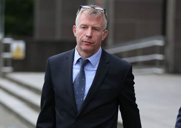 Dr Gerard McKaig leaves Glasgow Sheriff Court after giving evidence. Picture: PA