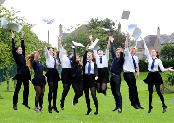 Craigmount High School students open their exam results. Picture: Lisa Ferguson