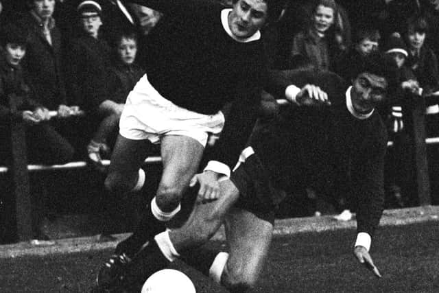 Falkirks Wilson Hoggan is tackled by Jim Hermiston of Aberdeen in the sectional round of the 1971 League Cup. Picture: SNS